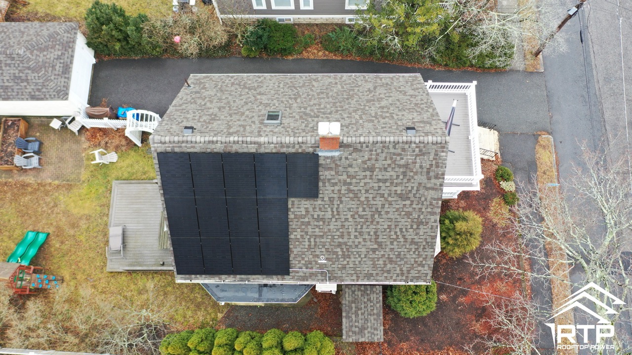 Aerial view of a completed Rooftop Power solar install in New England
